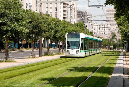 An eco-friendly electric tram in Paris, France that emits zero carbon. Trams have been operating as an eco-friendly form aof public transport all around the world. Photo: Paris Convention and Visiters Bureau