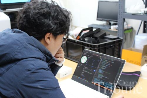A student does coding work in a space for Start-Up Azit teams.