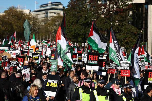 Waving Palestine flags, pro-Palestinian protesters gathered in London. / The Guardian