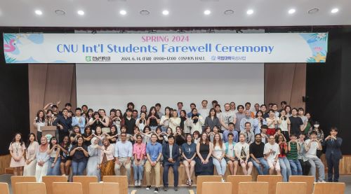 International students pose for a picture after the 2024 spring farewell ceremony at Cosmos Hall on June 14.   Photo: Office of International Affairs.