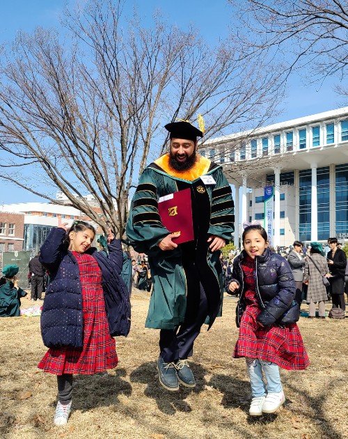 Shrif Saqib and his daughters