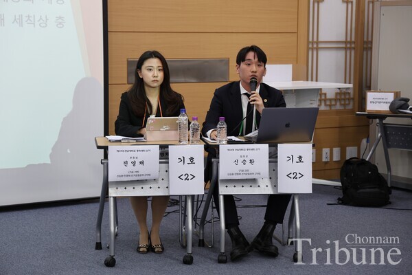 Shin Seung-hwan answers the question regarding their one of the pledges, the revision of the GSC regulation.