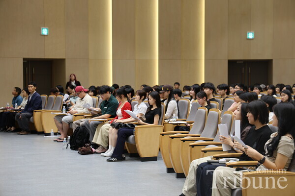 Students participate in the Book of the Year ceremony for 2025 GJRT.